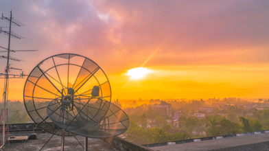 Satellite dish at sunset