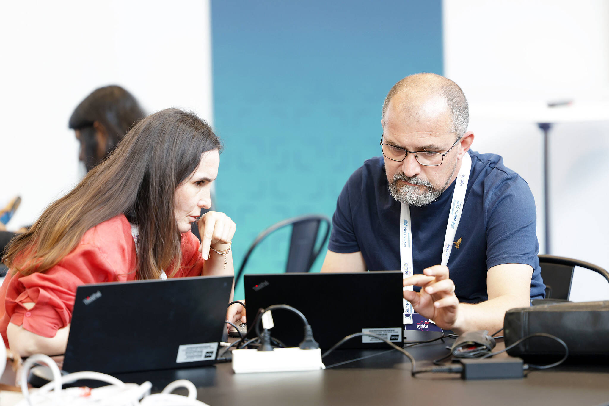 Two people at a hackathon at DTW Ignite 