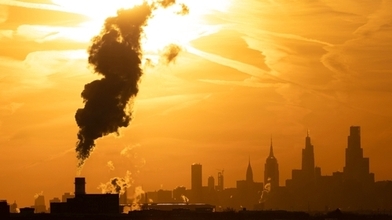 Smoking chimney with orange light